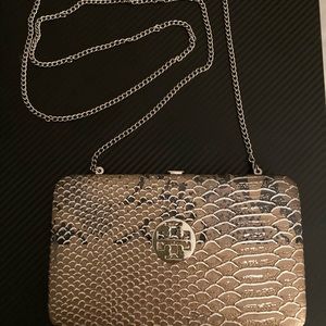 Like New Tory Burch Clutch, Cross Body with detachable silver strap.Day/Evening